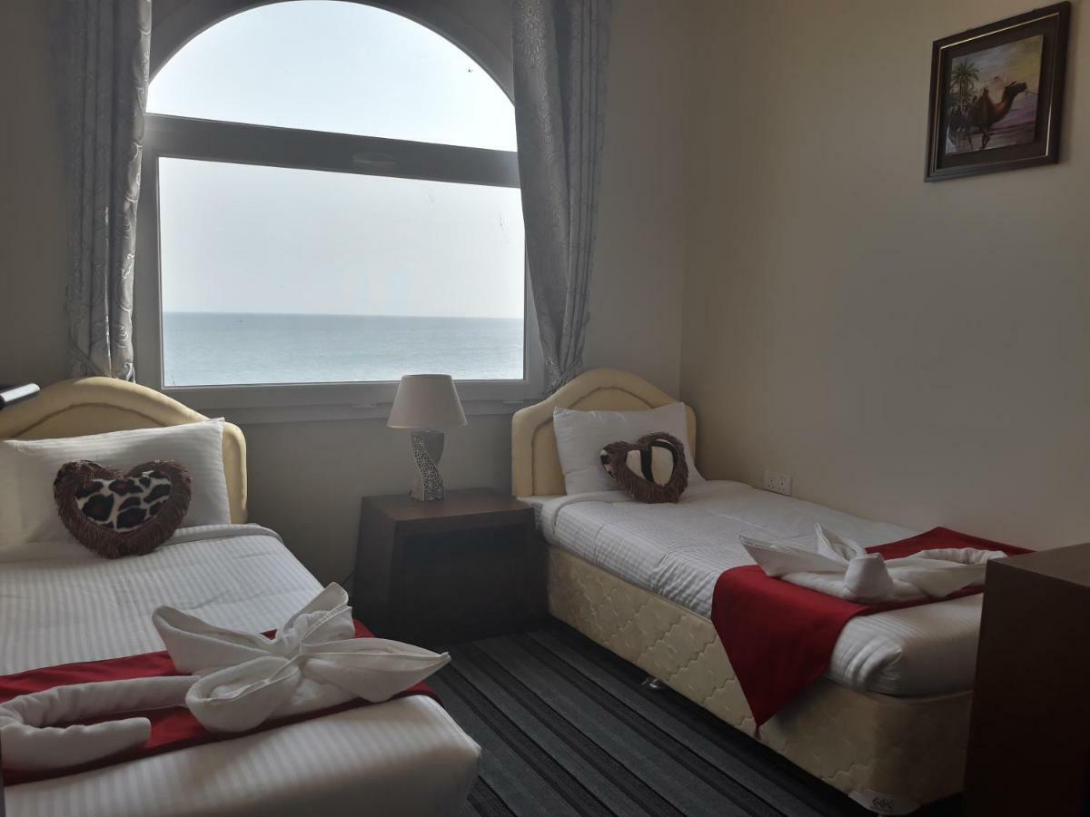 Sur Bandar Al Ayjah Hotel Apartments Bagian luar foto